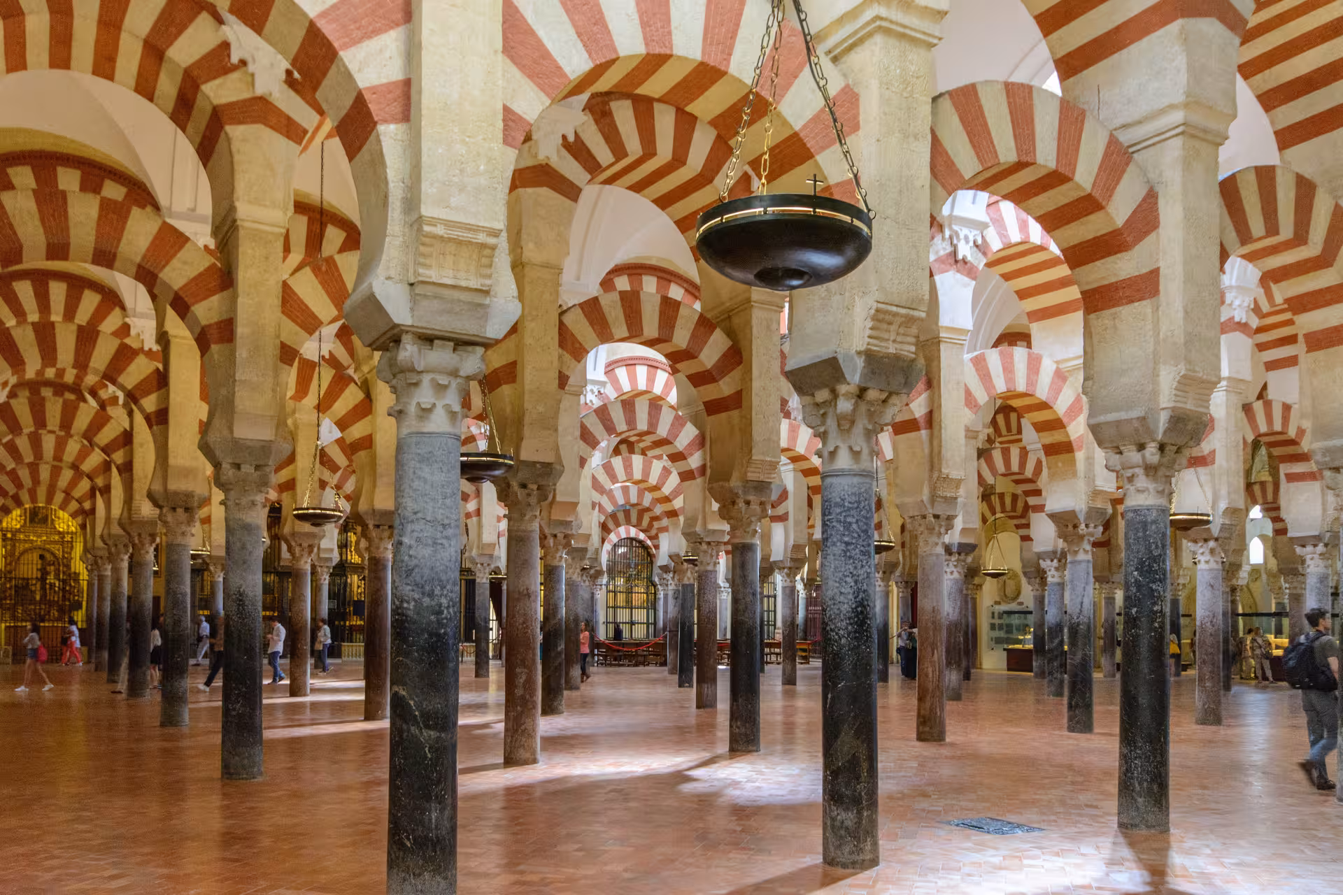 Explore the iconic arches of the Mosque-Cathedral of Córdoba on a 5-day Andalusia tour from Madrid.