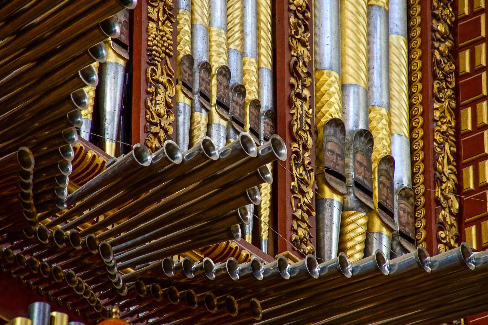 Discover the elaborate organ pipes and gilded details in the Mosque-Cathedral of Córdoba's grand interior.