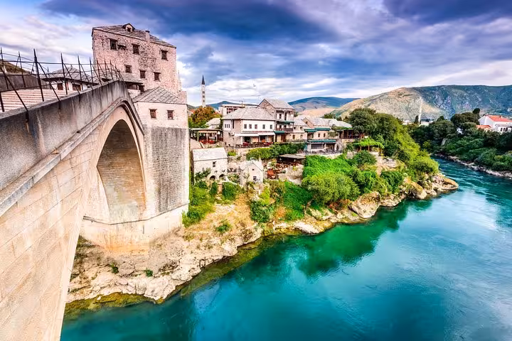 Mostar Old Bridge over the Neretva River, Bosnia day trip highlight on Discover Croatia & Surroundings private tour