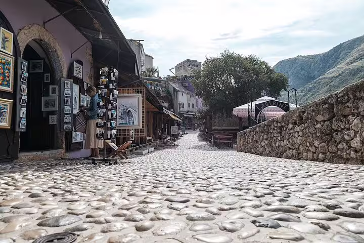 Cobblestone street in Mostar Old Town bazaar, Bosnia, on scheduled Mostar and Kravice Waterfalls tour
