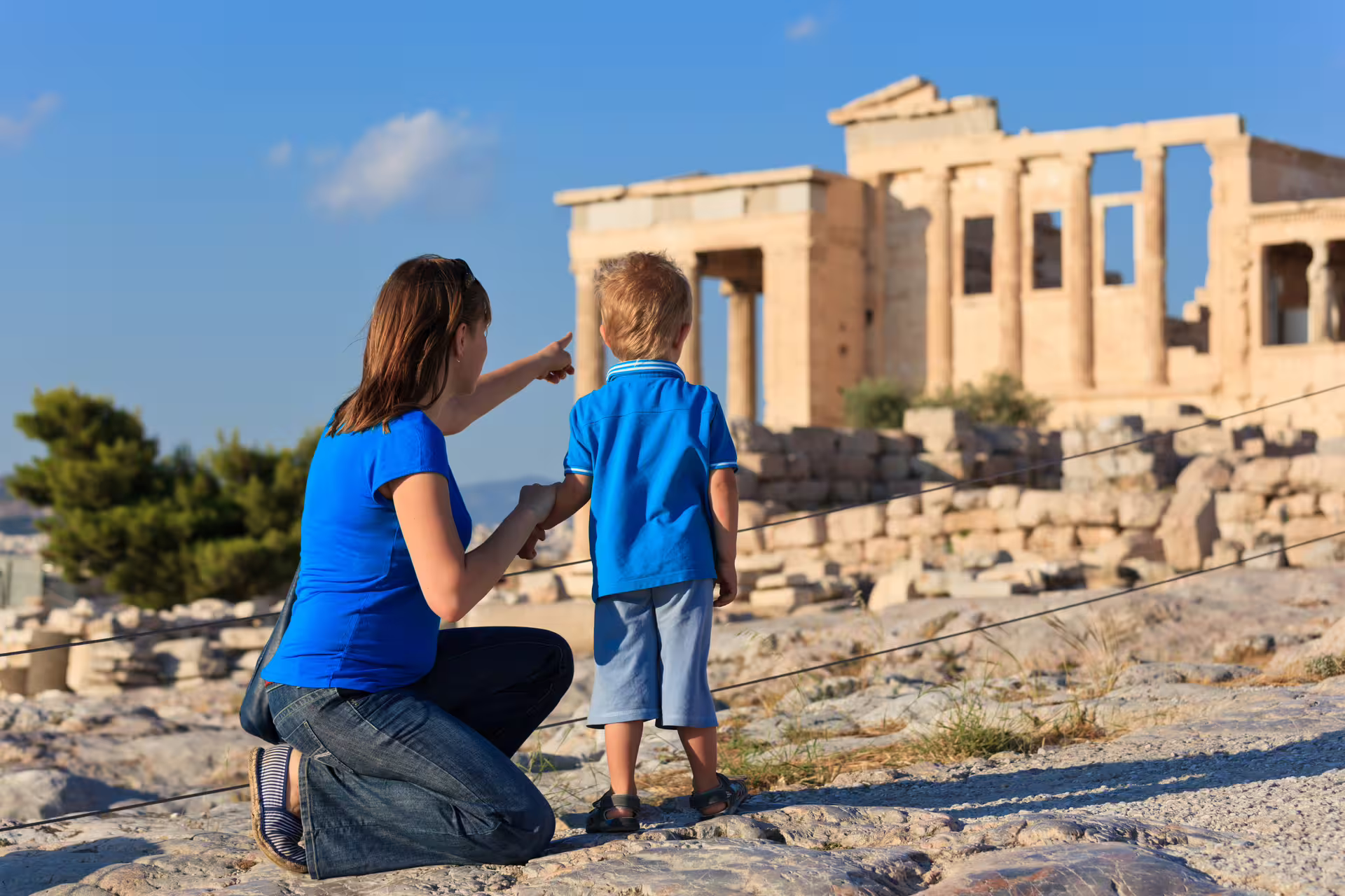 Mother and child viewing Acropolis ruins in Athens, family-friendly small group tour with included tickets