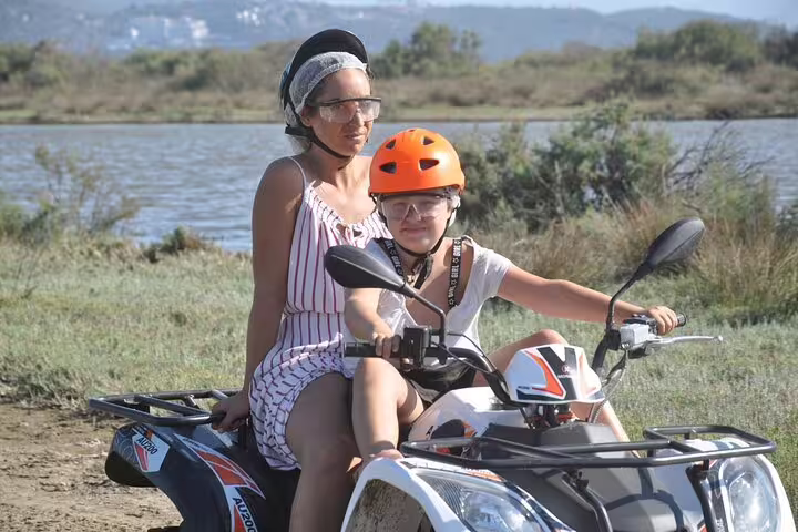 Mother and child enjoying a scenic quad ride near Kusadasi Port, perfect for family-friendly cruise excursions.