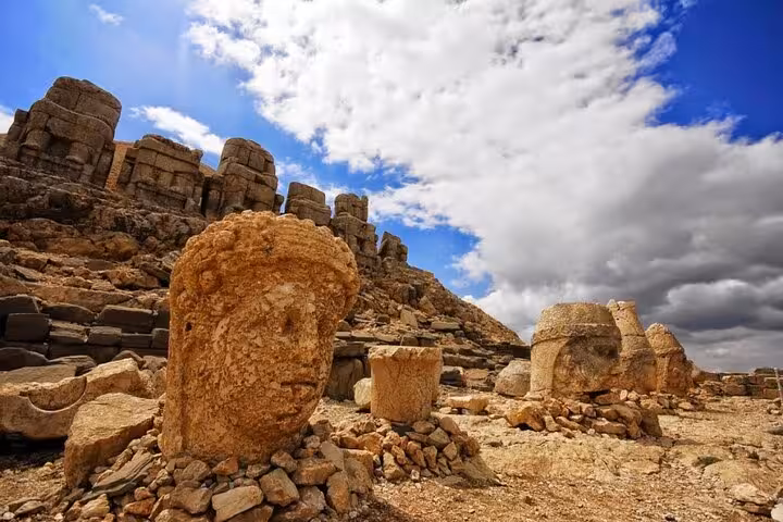 Close-up of fallen stone head statues on Mount Nemrut, key stop on 2-day 1-night Istanbul tour