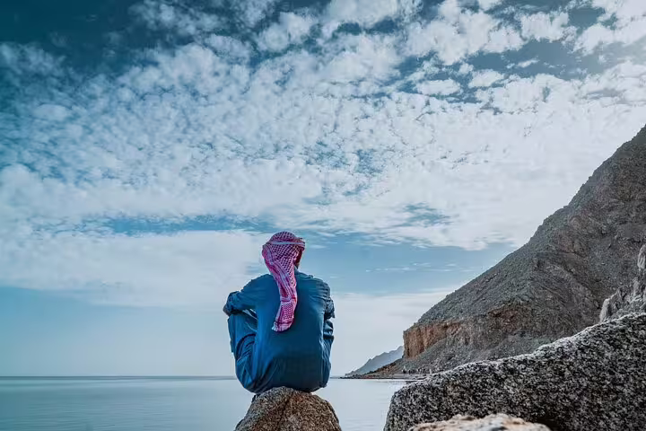 Traveler overlooking Sinai coastline on private overnight trip from Cairo to Mount Sinai and Saint Catherine
