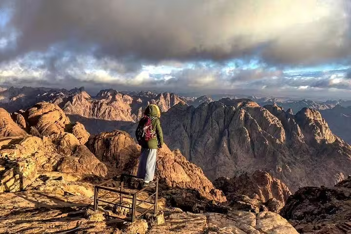 Hiker at Mount Sinai sunrise viewpoint, St Catherine night tour from Cairo by private bus in Sinai