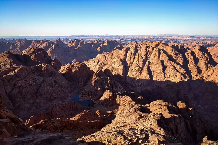 Panoramic sunrise view from Mount Sinai summit on private climb from Sharm El Sheikh to St Catherine Monastery