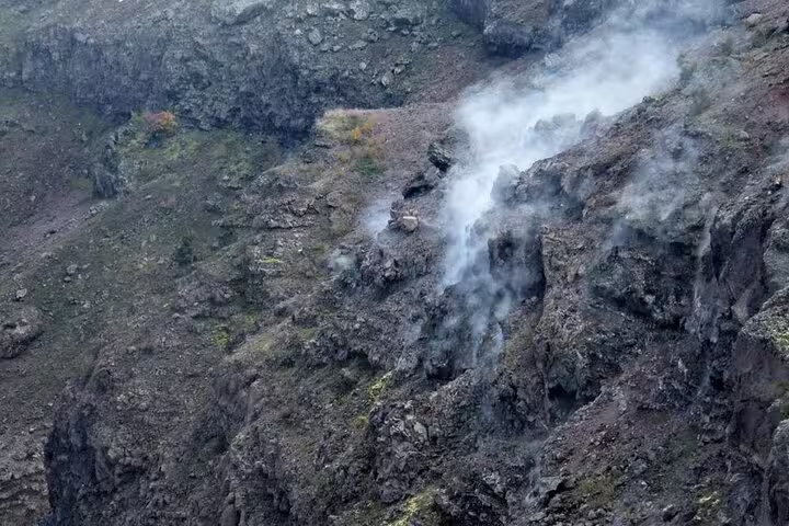 Steam vents on Mount Vesuvius crater wall during VIP small-group tour with skip-the-line ticket access