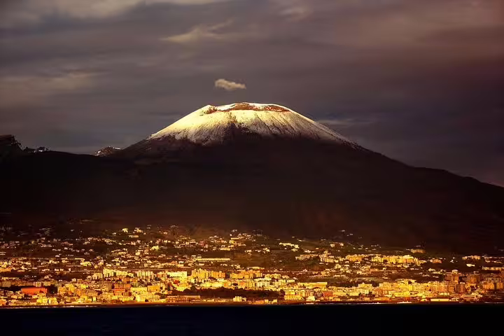 Mount Vesuvius volcano view over Naples Bay at sunset, highlight of low-cost Vesuvius tour from Naples