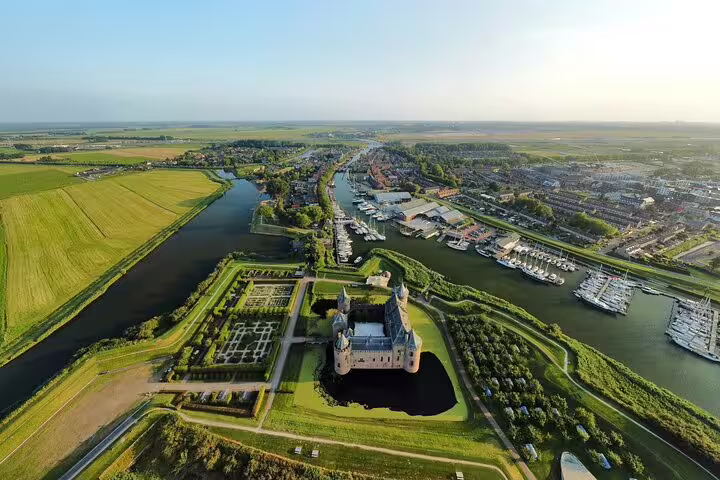 Aerial of Muiden and Muiderslot Castle, scenic countryside route on a private bike tour from Amsterdam