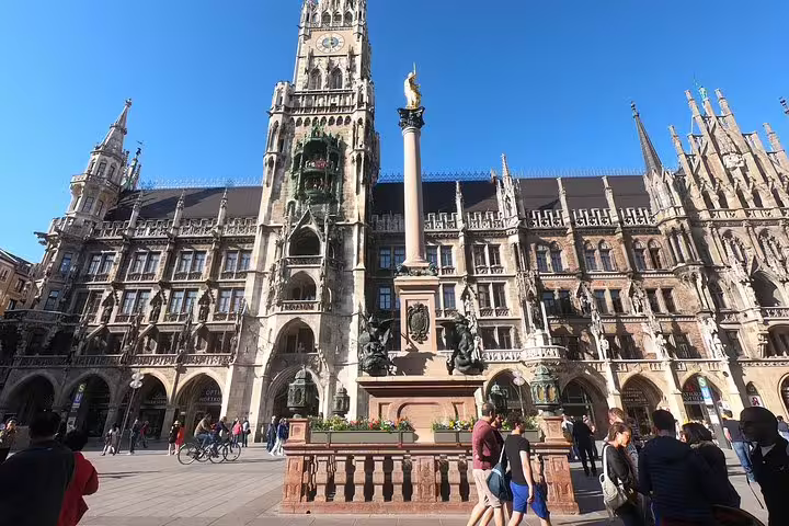 Marienplatz with New Town Hall and Mariensäule column in Munich, Germany on a sunny day