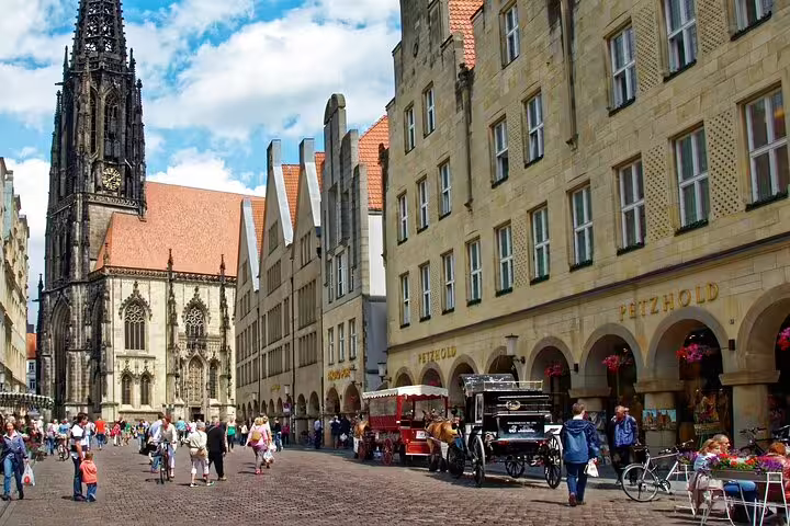 Münster Prinzipalmarkt and St. Paulus Cathedral on a self-paced e-scavenger hunt city exploration walk