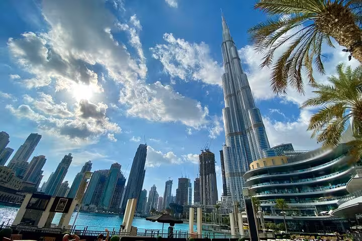 Skyline view of Burj Khalifa and Downtown Dubai lagoon, a highlight arrival point on the Muscat to Dubai private transfer