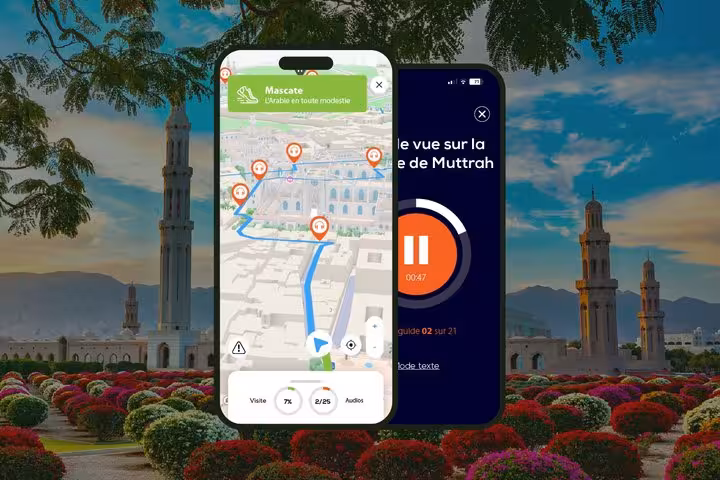 Muscat self-guided walking tour app showing GPS map with audio guide and Muttrah Corniche route on smartphone