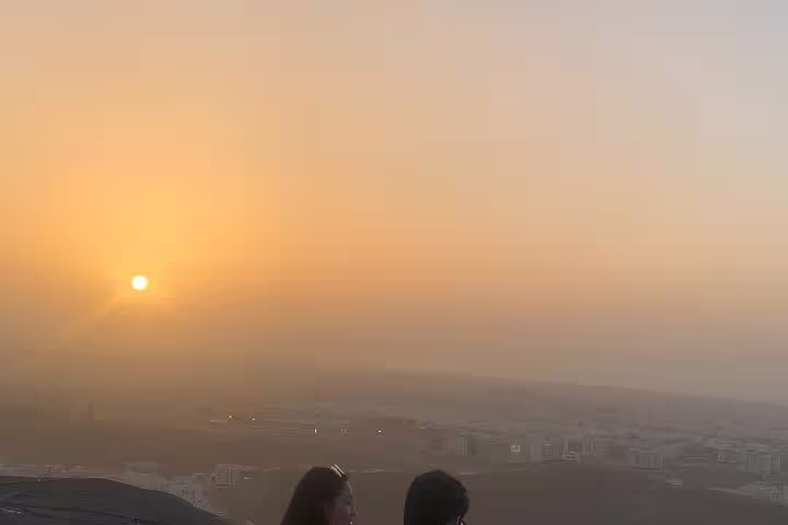 Witness a stunning sunrise over Muscat's cityscape on a private morning tour with an expert Omani guide.