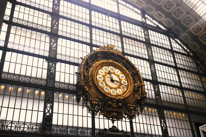 Ornate Musée d'Orsay station clock in Paris, included with private Seine walk and Love Locks Bridge tour