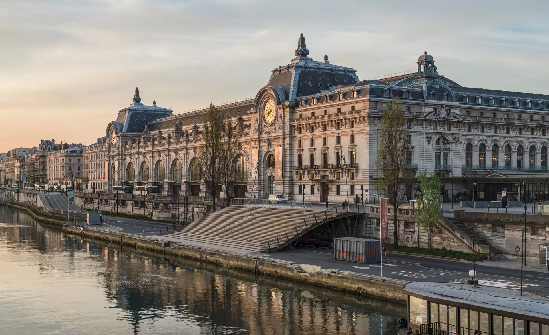 Musée d'Orsay along the Seine River at sunset, Paris