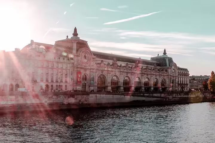 Musée d'Orsay along the Seine River in Paris on a sunny day