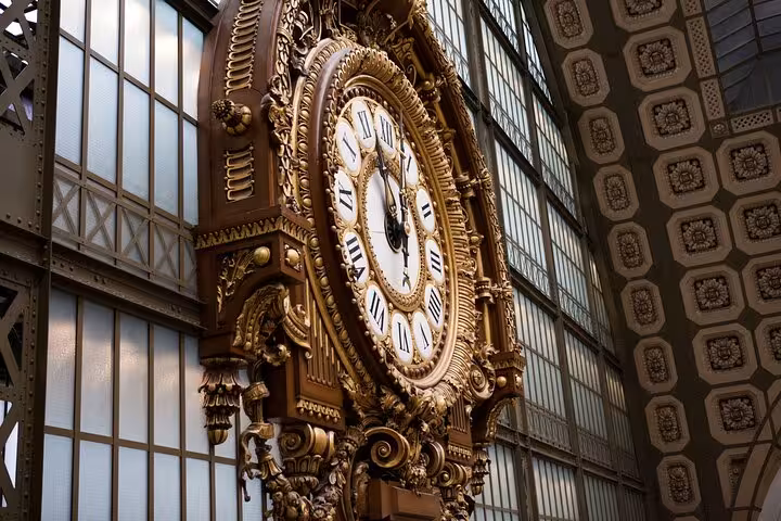Close-up of the Musée d'Orsay gilded clock, part of Paris private Seine walk and Love Locks Bridge tickets