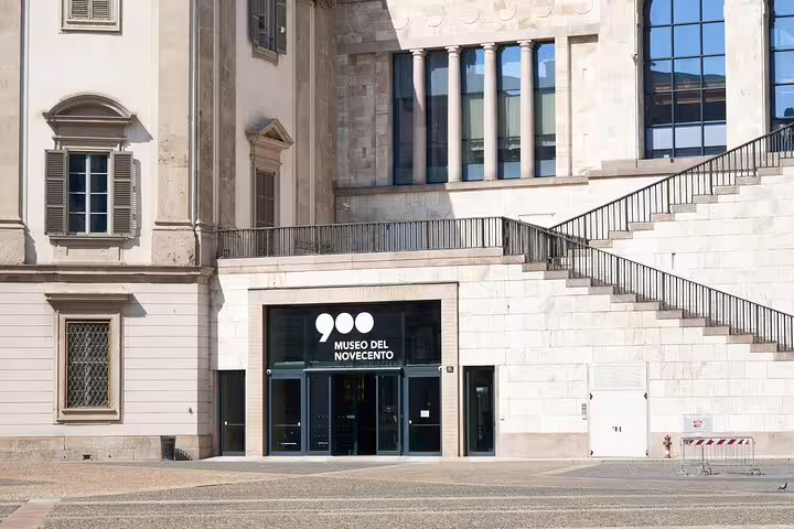 Entrance to Museo del Novecento in Milan with grand staircase and classical facade