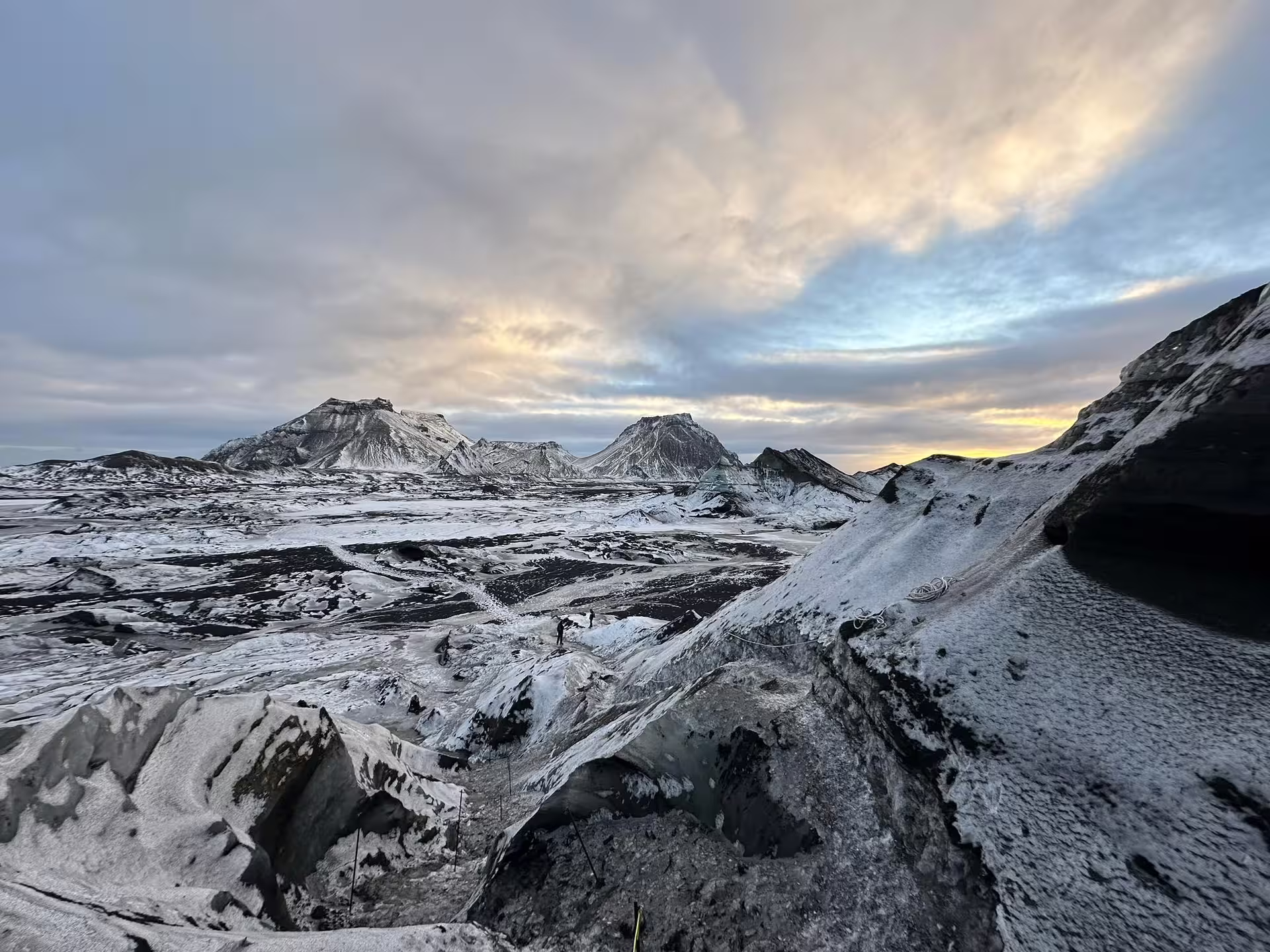 Panoramic view of Myrdalsjokull glacier landscape near Vik with snow-dusted volcanic peaks on Katla ice cave tour