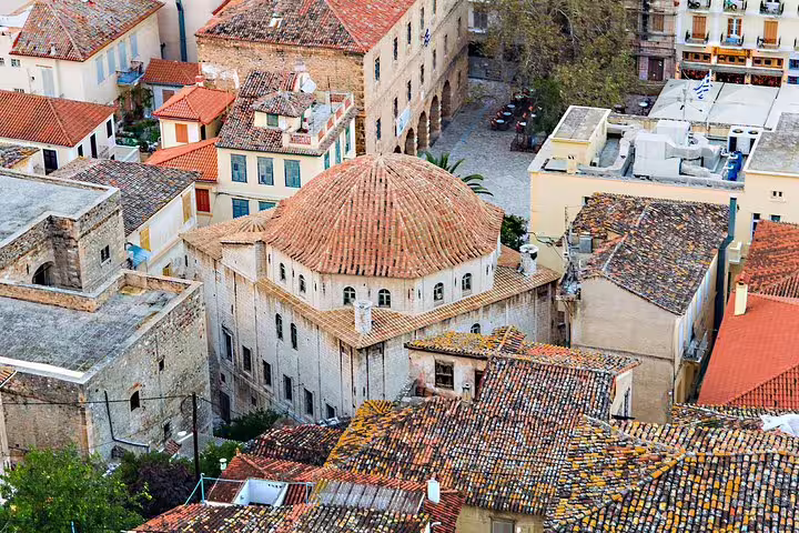 Old Town Nafplio red-tiled rooftops and historic church, charming stop on private Athens day tour to Peloponnese