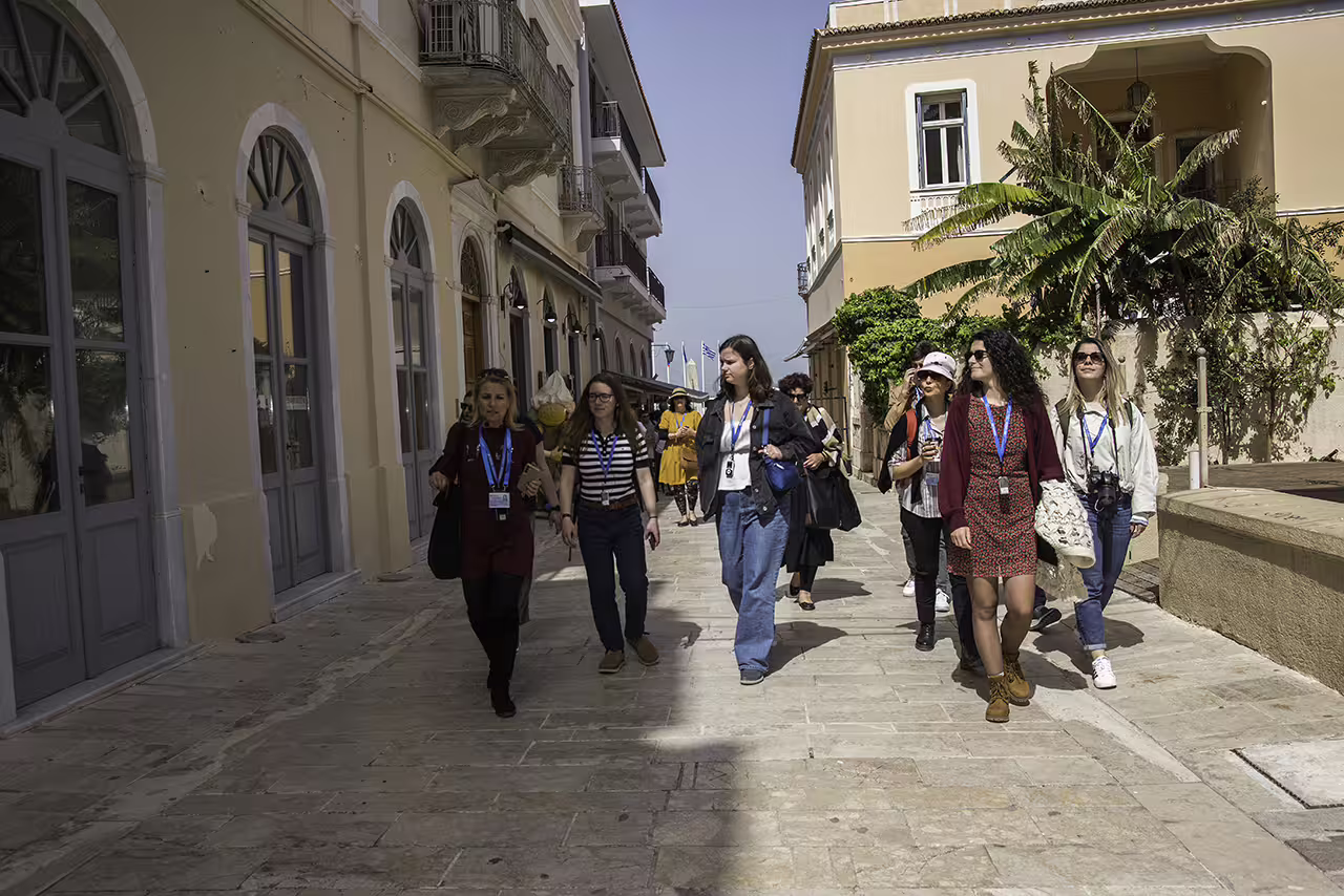 Guided walking tour group in Nafplion old town streets on the Ancient Corinth and Nafplion full-day excursion