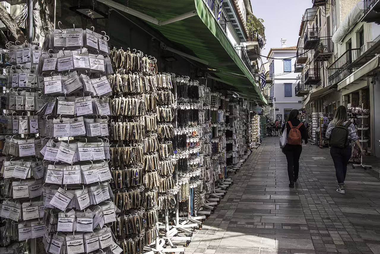 Nafplion old town shopping street with souvenir stalls, a stop on the Ancient Corinth and Nafplion full-day tour