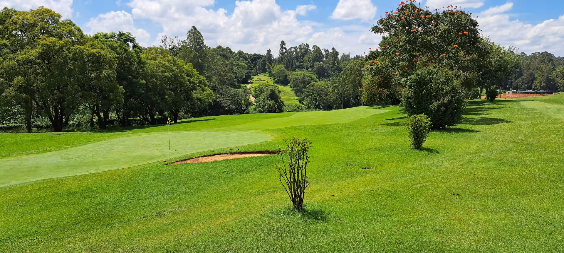 Lush green golf course in Nairobi, showcasing the beauty of the Nairobi, Naivasha, Maasai Mara & Coast Golf Adventure.