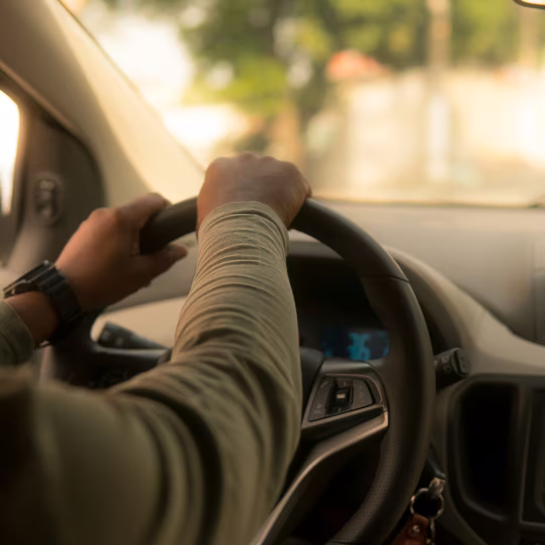 Professional chauffeur driving comfortable vehicle on scenic route for Naples to Avellino door-to-door transfer