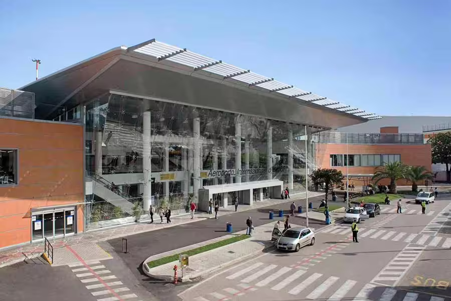 Naples Capodichino Airport terminal exterior, convenient pickup for private transfer from Naples to Caserta or vice versa