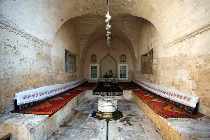 Traditional stone room with central fountain, a cultural stop on the Mount Nemrut and Gobekli Tepe tour