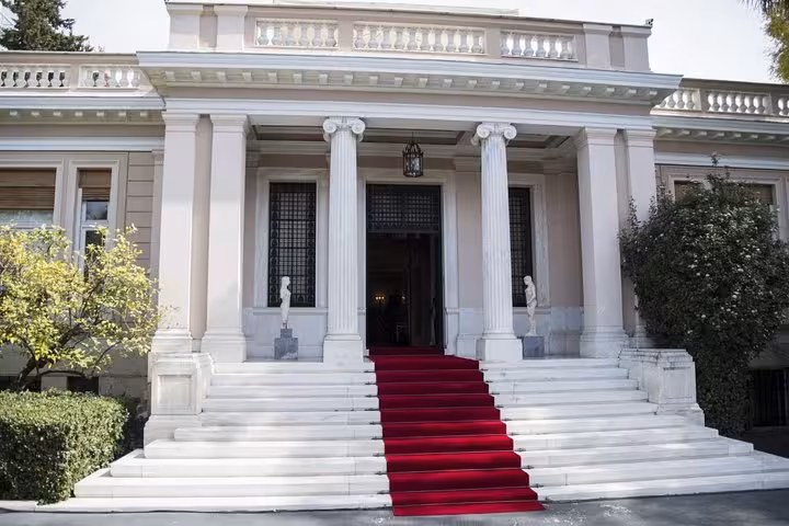 Neoclassical Athens mansion with red-carpet steps, featured on a private luxury Acropolis half-day tour