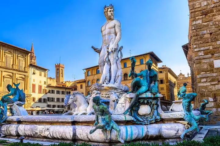 The stunning Neptune Fountain in Piazza della Signoria, a highlight of Florence's cultural tour from Livorno port.