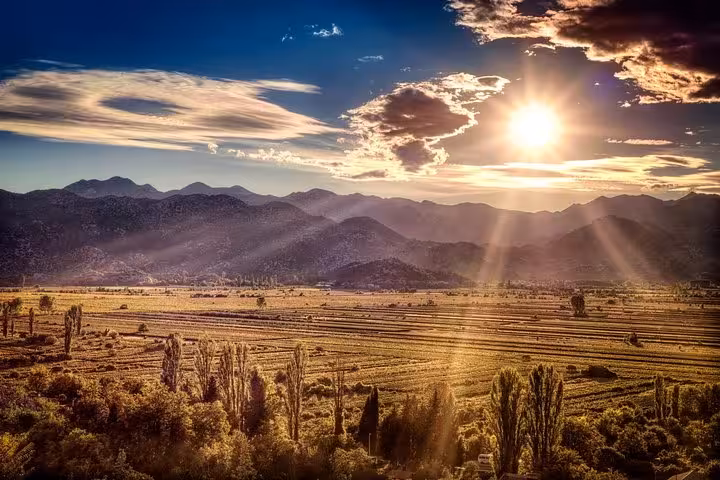 Sunset over Neretva Valley vineyards and mountains, scenic stop on The BEST of Croatia 8-day private tour