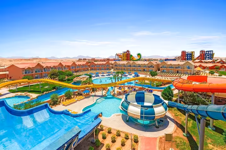 Family pools and twisting water slides at Neverland Aqua Park from Hurghada with lunch and round-trip transfers