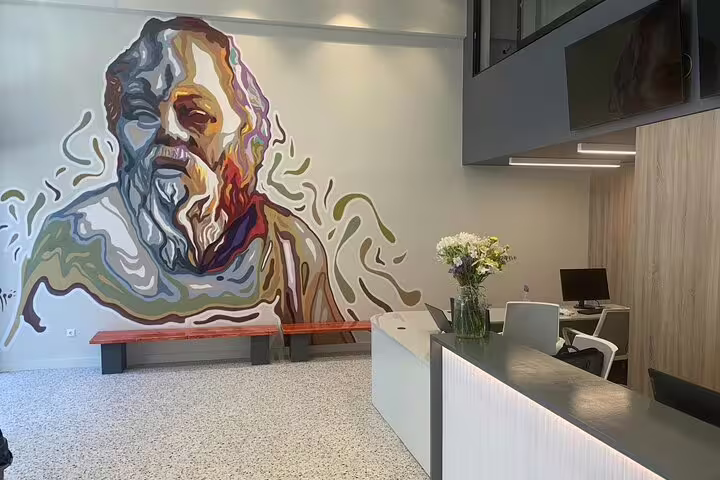 Modern lobby mural at New Acropolis Museum entrance, part of Acropolis and Parthenon walking tour Athens