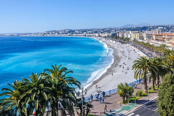 Panoramic Nice Promenade des Anglais beach and turquoise sea on private driver sightseeing tour from Cannes