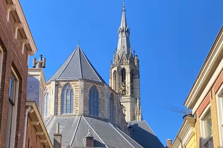 Nieuwe Kerk church tower in Delft old town, stop on private Rotterdam to Kinderdijk Delft and The Hague tour