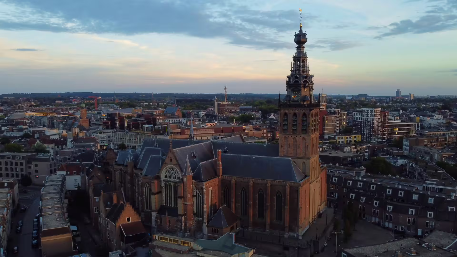 Aerial view of Stevenskerk and Nijmegen old town at sunset, highlight of 1-day walking tour audioguide