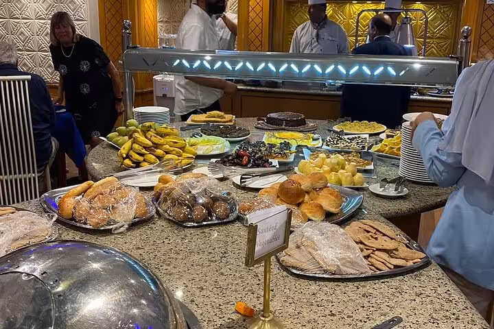 Onboard dessert and bread buffet on 4-day Nile cruise Aswan to Luxor, fresh pastries and Egyptian sweets