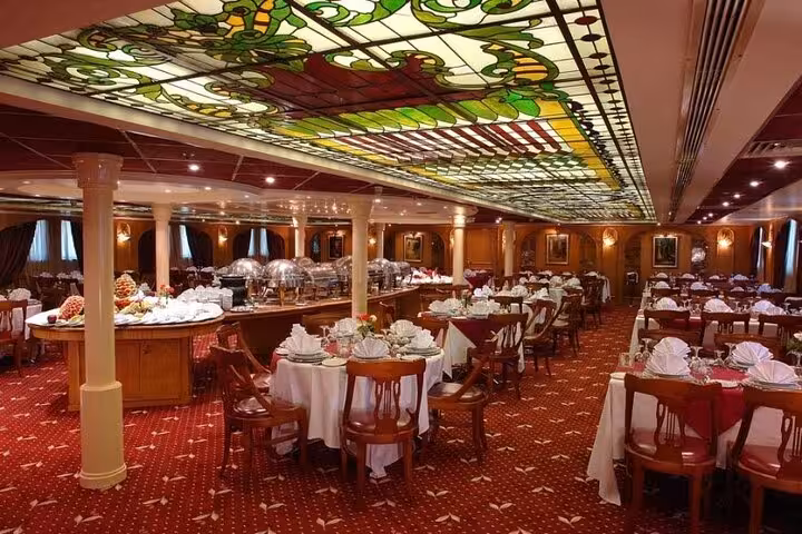 Elegant Nile cruise dining room with buffet, ideal for 4-day Aswan to Luxor cruise package