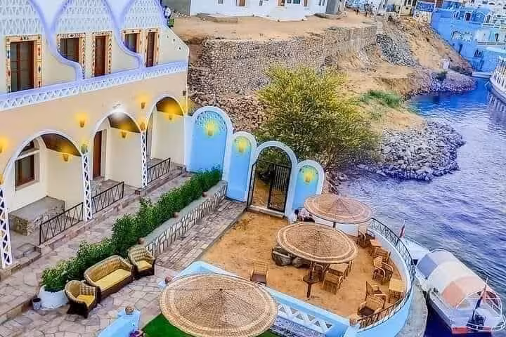 Riverside Nile hotel terrace in Aswan, a relaxing stop on the 4-day Nile cruise to Luxor and Abu Simbel