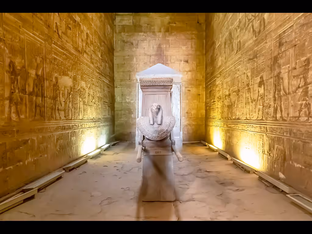 Ancient Egyptian temple corridor with hieroglyphs and sphinx statue on 8-day Nile cruise Cairo to Abu Simbel
