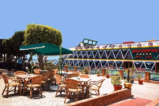 Outdoor seating by Nile Crystal Cairo cruise dock, ideal for dinner cruise with transfers and belly dancer