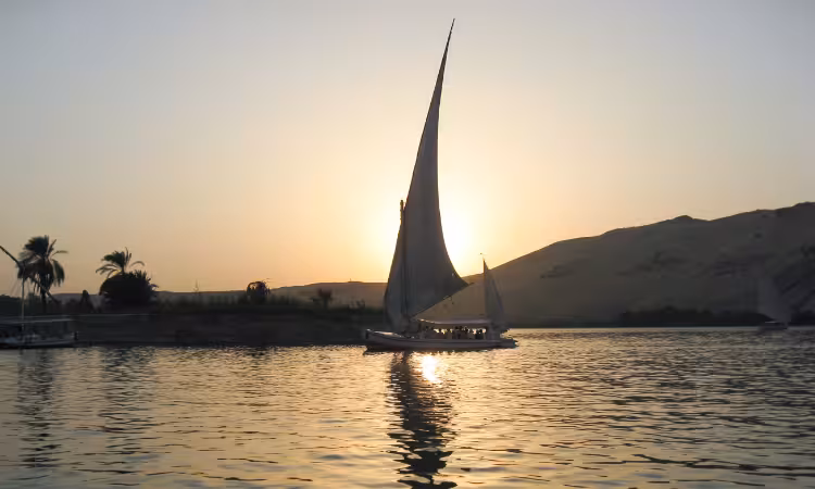 Sunset felucca sail on the Nile River in Aswan, scenic stop on 15-day Egypt tour from Red Sea to Luxor