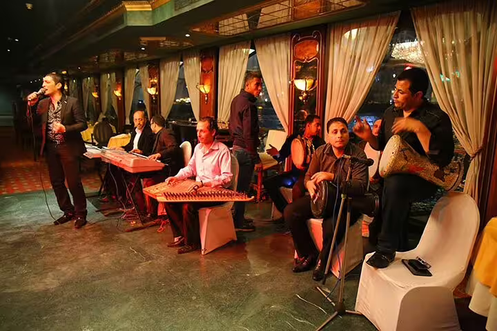 Live Egyptian band performing onboard Nile Maxim dinner cruise Cairo with oriental show and Tannura music