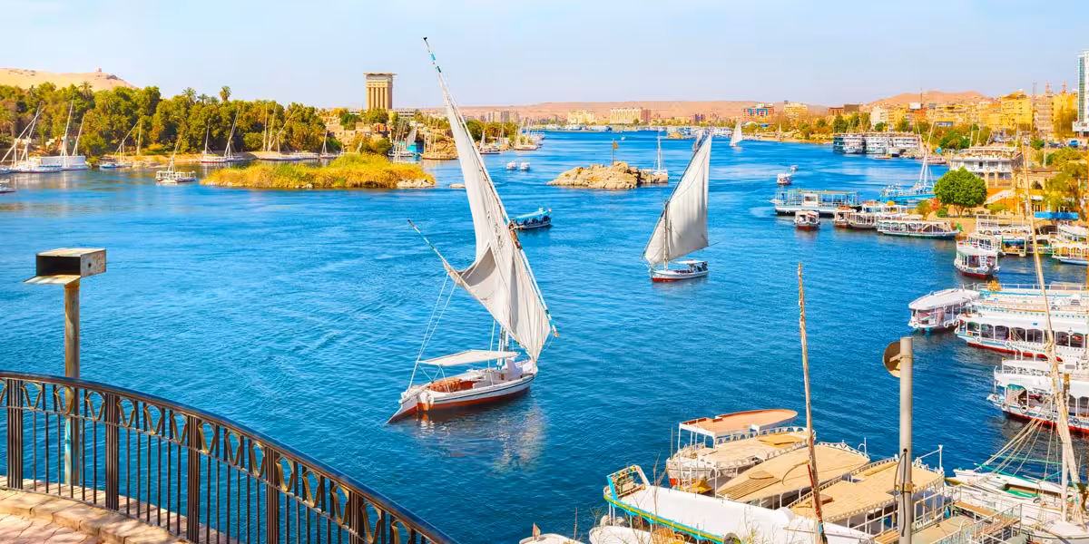 Nile River in Aswan with felucca sailboats and riverboats, scenic highlight of 3-day private Egypt tour