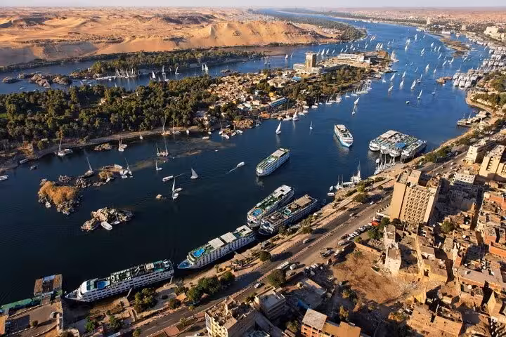 Aerial view of Nile River in Luxor with cruise boats, start of VIP Dahabiya cruise to Aswan 5 days