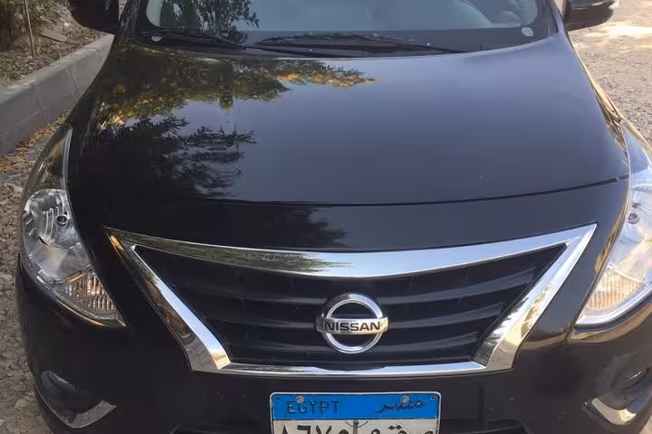 Modern Nissan sedan for Marsa Alam to Hurghada airport transfer, comfortable private ride with driver
