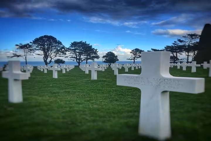 Rows of white crosses at Normandy American Cemetery overlooking the D-Day beaches in France